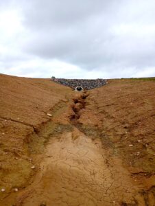 Erosion due to lack of stabilization in a channel